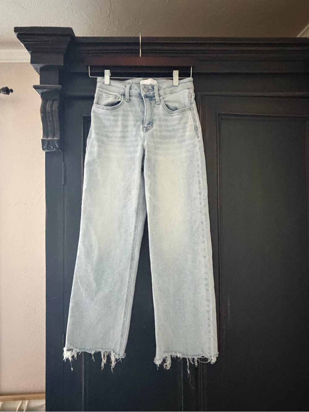 Light Blue High-Rise Wide Leg Jeans with Distressed Hem